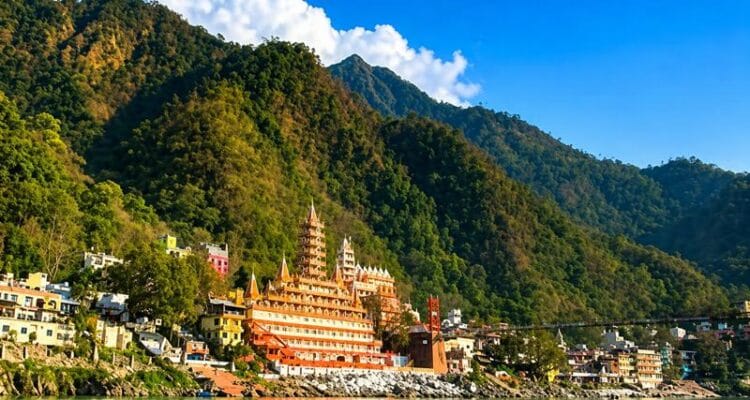 Rishikesh river view with temple and mountains in Uttarakhand