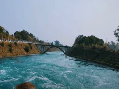 Top view of Bhakra Nangal Dam with Sutlej River, reservoir, and dam road