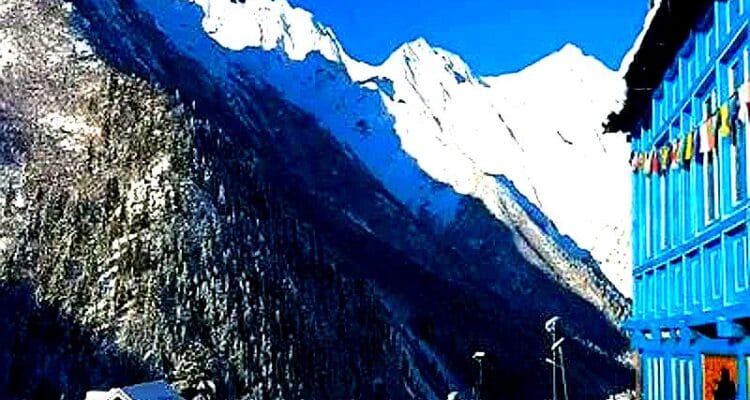Scenic Himachal border road with snow mountains and clear blue sky