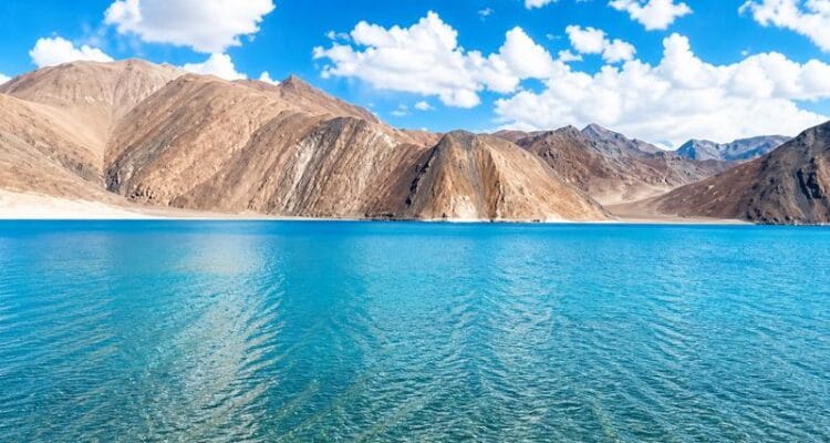 Beautiful Pangong Lake view in Ladakh with mountains and blue sky