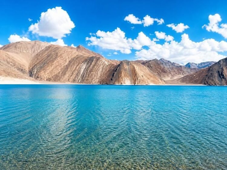 Beautiful Pangong Lake view in Ladakh with mountains and blue sky